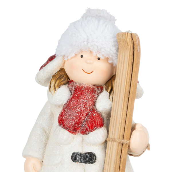 Bambina in bianco con sci Froik 23 cm